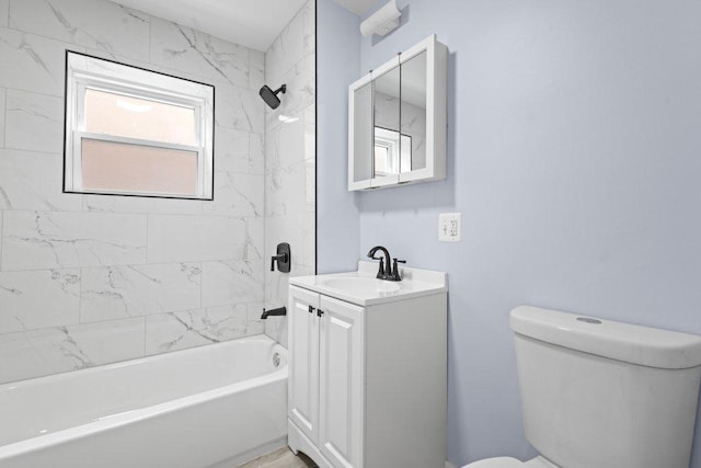 full bath with vanity, toilet, and  shower combination