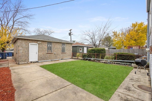 view of yard with a patio area and fence