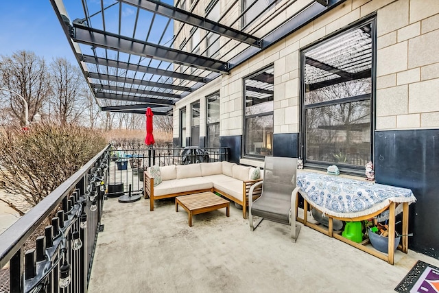 view of patio with an outdoor living space, a balcony, and a pergola