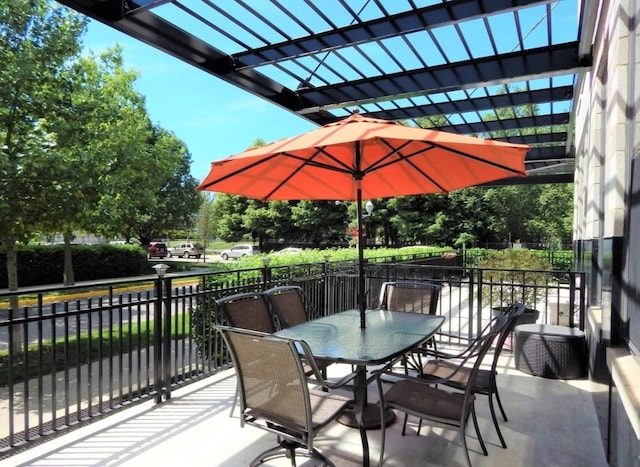 view of patio / terrace featuring outdoor dining area and a pergola