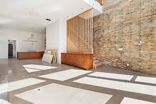 welcome area with a sink and stairs