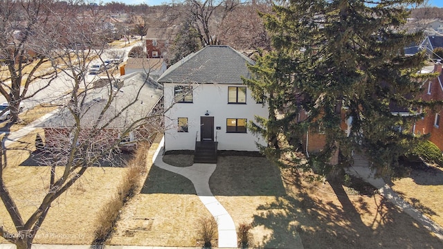 view of front of home featuring stucco siding