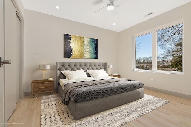 bedroom with light wood-style flooring, baseboards, visible vents, recessed lighting, and ceiling fan