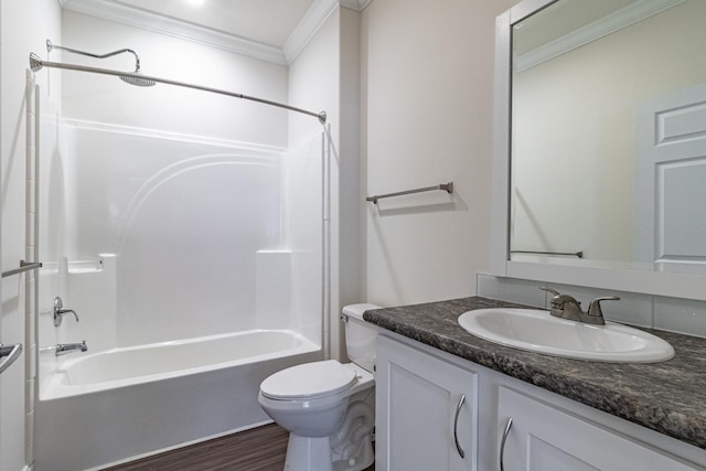 bathroom featuring toilet, shower / tub combination, ornamental molding, wood finished floors, and vanity