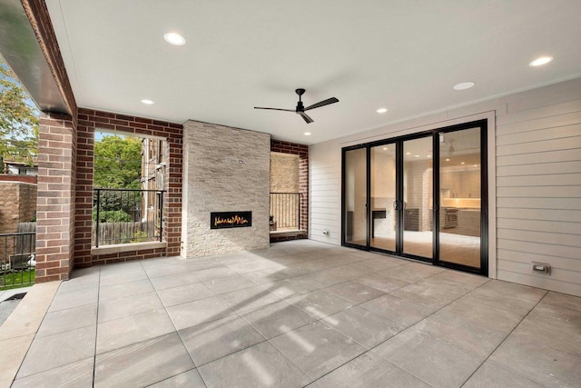 view of patio / terrace with a ceiling fan