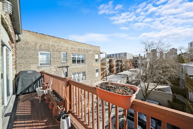 balcony featuring area for grilling