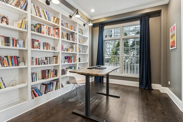 office with dark wood-style flooring, built in features, baseboards, and ornamental molding