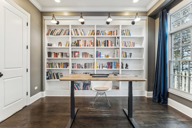 office space with crown molding, wood finished floors, and baseboards