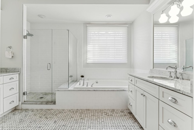 bathroom featuring vanity, a garden tub, a stall shower, and tile patterned floors