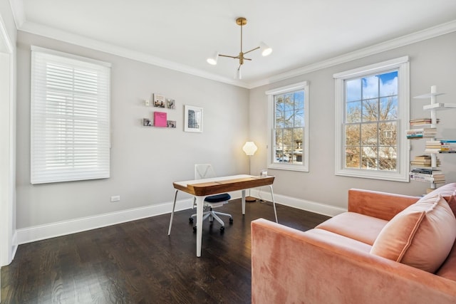 office space featuring baseboards, wood finished floors, a notable chandelier, and ornamental molding