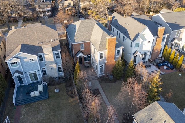 birds eye view of property with a residential view