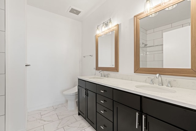 bathroom with visible vents, marble finish floor, toilet, and a sink