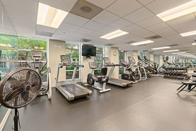 gym featuring a paneled ceiling