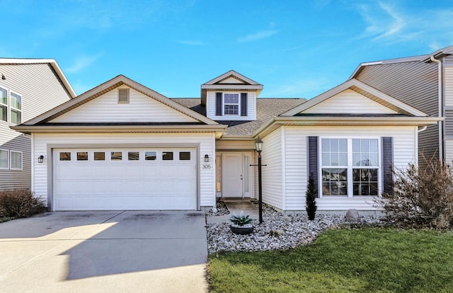 traditional-style home with concrete driveway and a garage