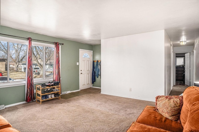 living room with baseboards and carpet floors