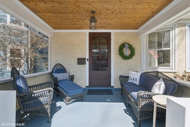 view of patio featuring a porch and an outdoor hangout area