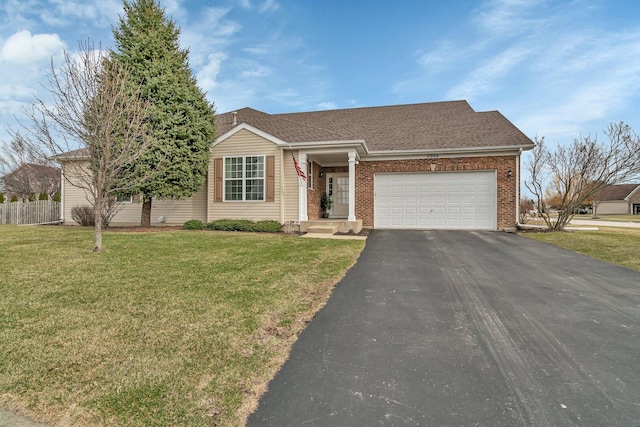 ranch-style house with driveway, fence, an attached garage, brick siding, and a front lawn