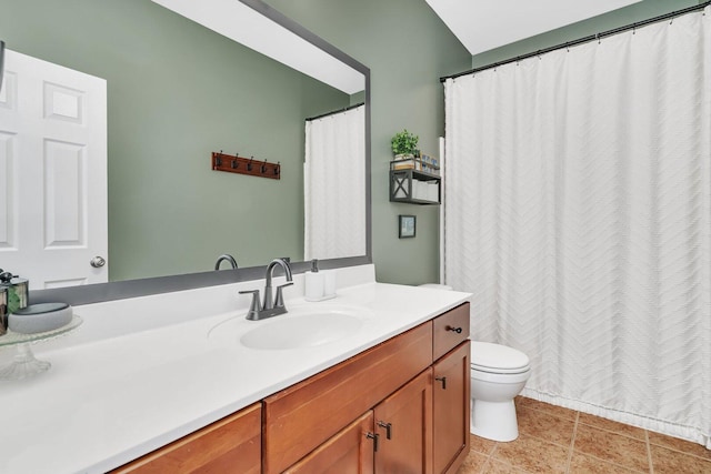 full bath with toilet, vanity, curtained shower, and tile patterned flooring