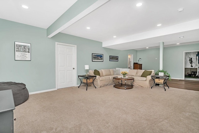 carpeted living room with baseboards, recessed lighting, and beam ceiling