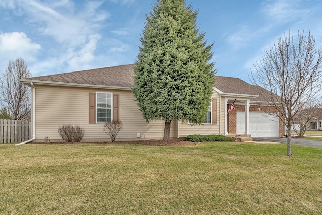 single story home featuring fence, a garage, a front yard, roof with shingles, and driveway