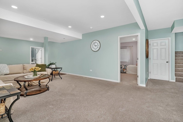 carpeted living room featuring baseboards, stairway, and recessed lighting