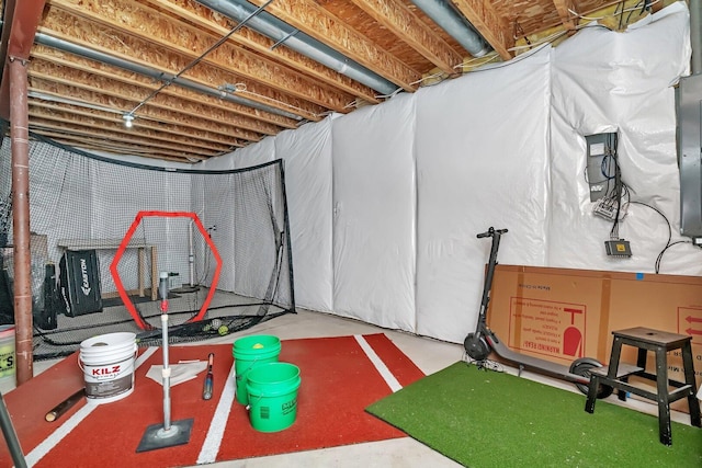 workout room featuring electric panel