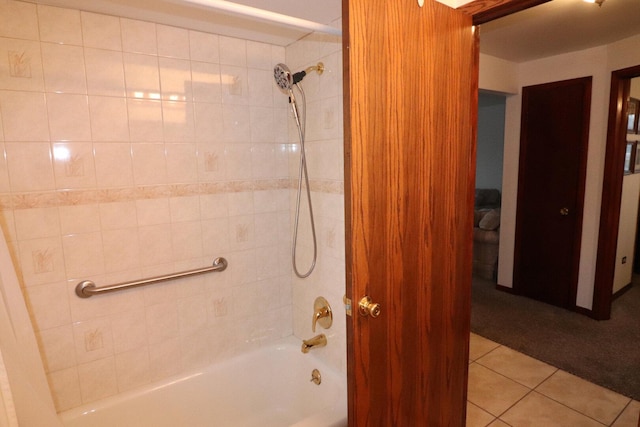 bathroom with tile patterned floors and  shower combination