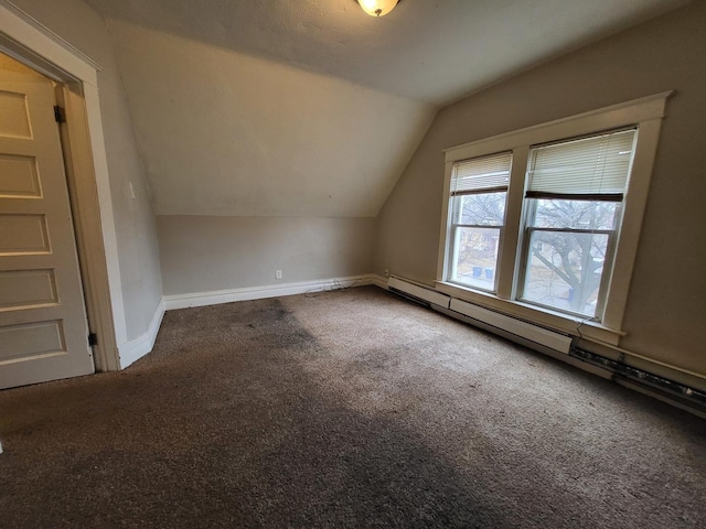 bonus room with baseboards, a baseboard radiator, carpet floors, and lofted ceiling