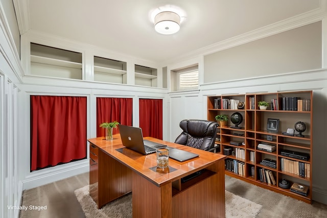 carpeted home office with crown molding