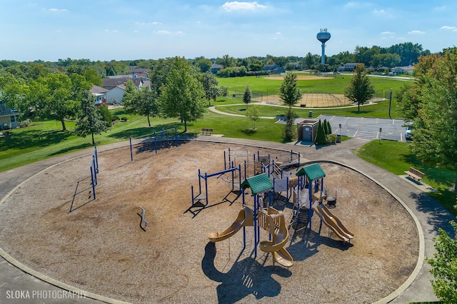 exterior space with a lawn and playground community