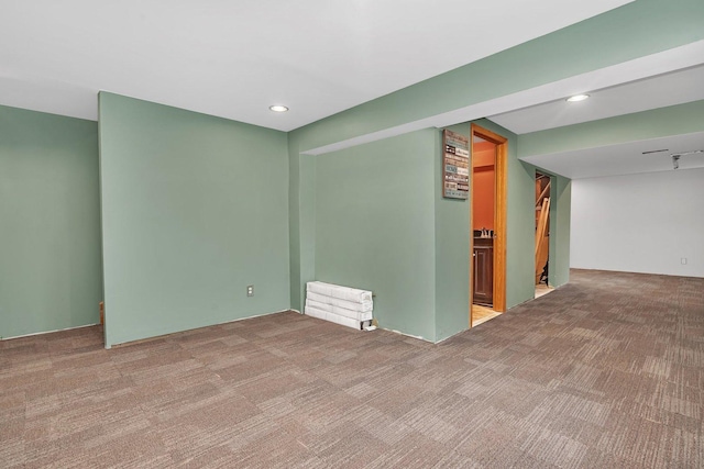 carpeted spare room with recessed lighting