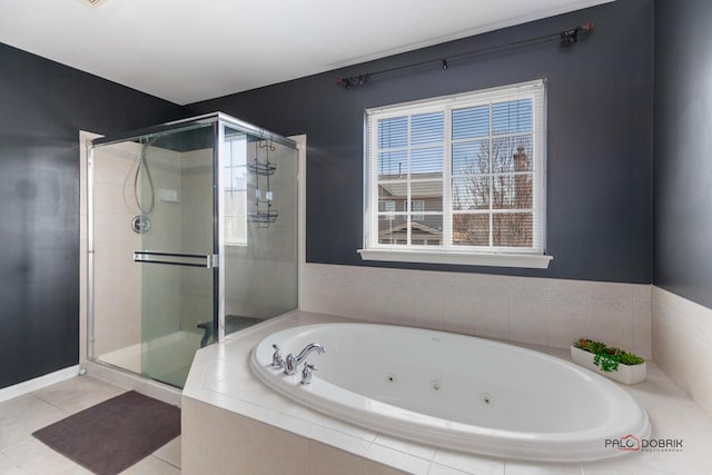 full bathroom featuring a shower stall, a wealth of natural light, and a whirlpool tub