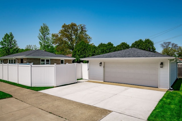 detached garage with fence