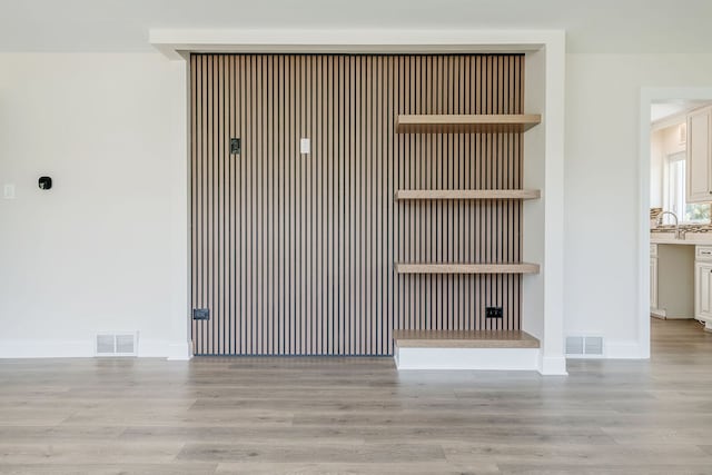 detailed view of wood finished floors and baseboards