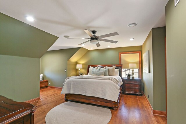 bedroom featuring recessed lighting, wood finished floors, baseboards, and ceiling fan