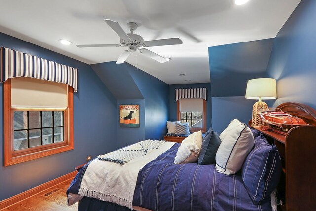 bedroom featuring visible vents, a ceiling fan, wood finished floors, recessed lighting, and baseboards