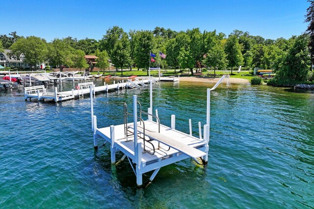 view of dock with a water view