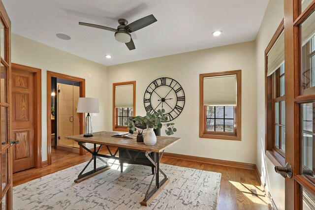 office area featuring recessed lighting, ceiling fan, baseboards, and wood finished floors