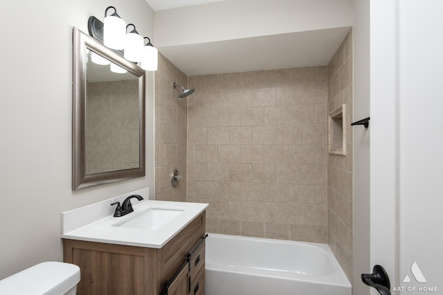 full bath featuring vanity, bathing tub / shower combination, and toilet