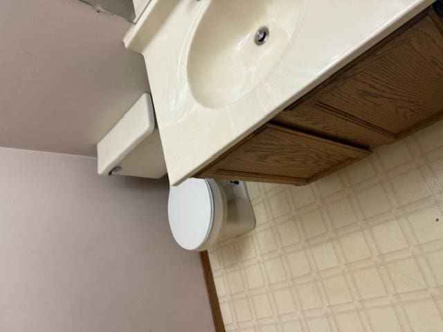 bathroom featuring tile patterned floors and toilet