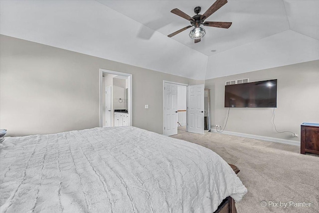 carpeted bedroom featuring a ceiling fan, vaulted ceiling, visible vents, and baseboards