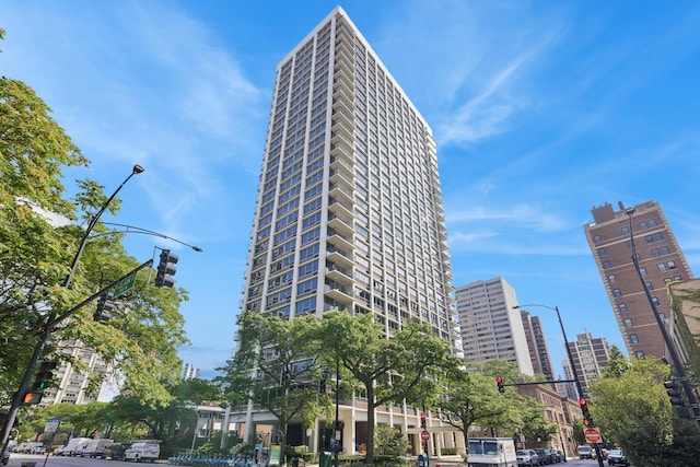 view of building exterior featuring a view of city