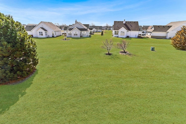 view of yard with a residential view