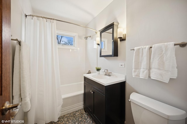 full bathroom featuring shower / tub combo, toilet, and vanity