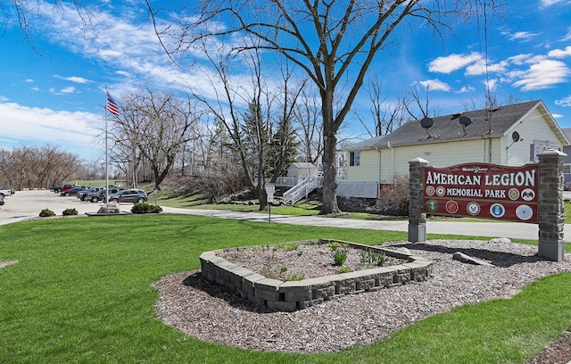 view of community featuring a lawn