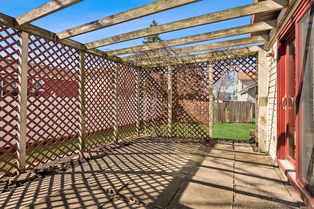 view of patio / terrace with fence and a pergola