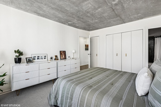 bedroom featuring two closets and carpet