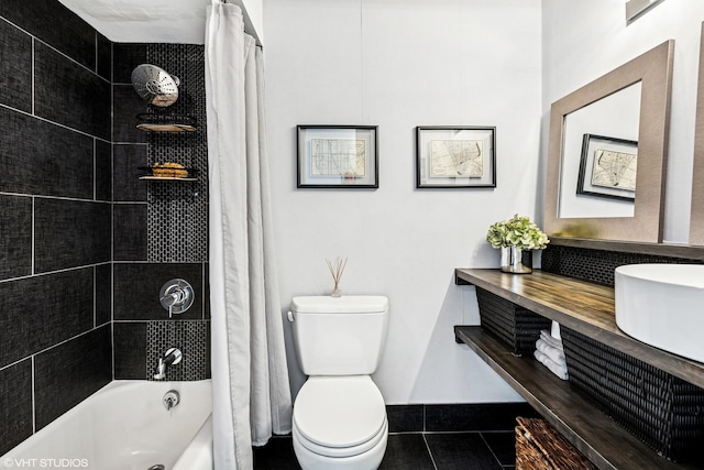 bathroom with vanity, toilet, and shower / tub combo