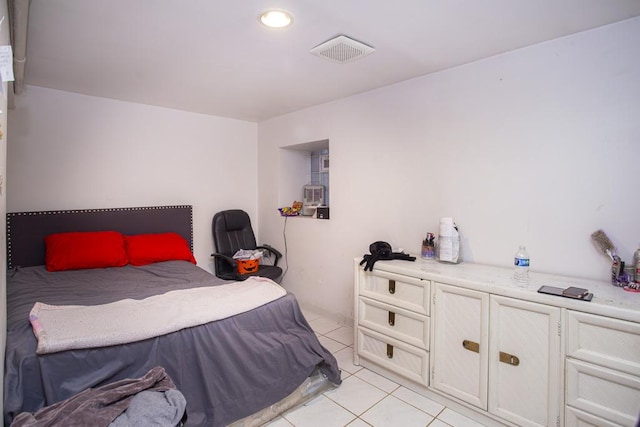 2652 W 22nd Pl, Chicago, IL 60608 - bedroom with light tile patterned floors and visible vents