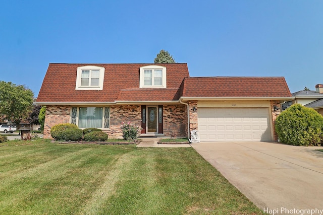 front of property featuring roof with shingles, mansard roof, a front lawn, a garage, and brick siding